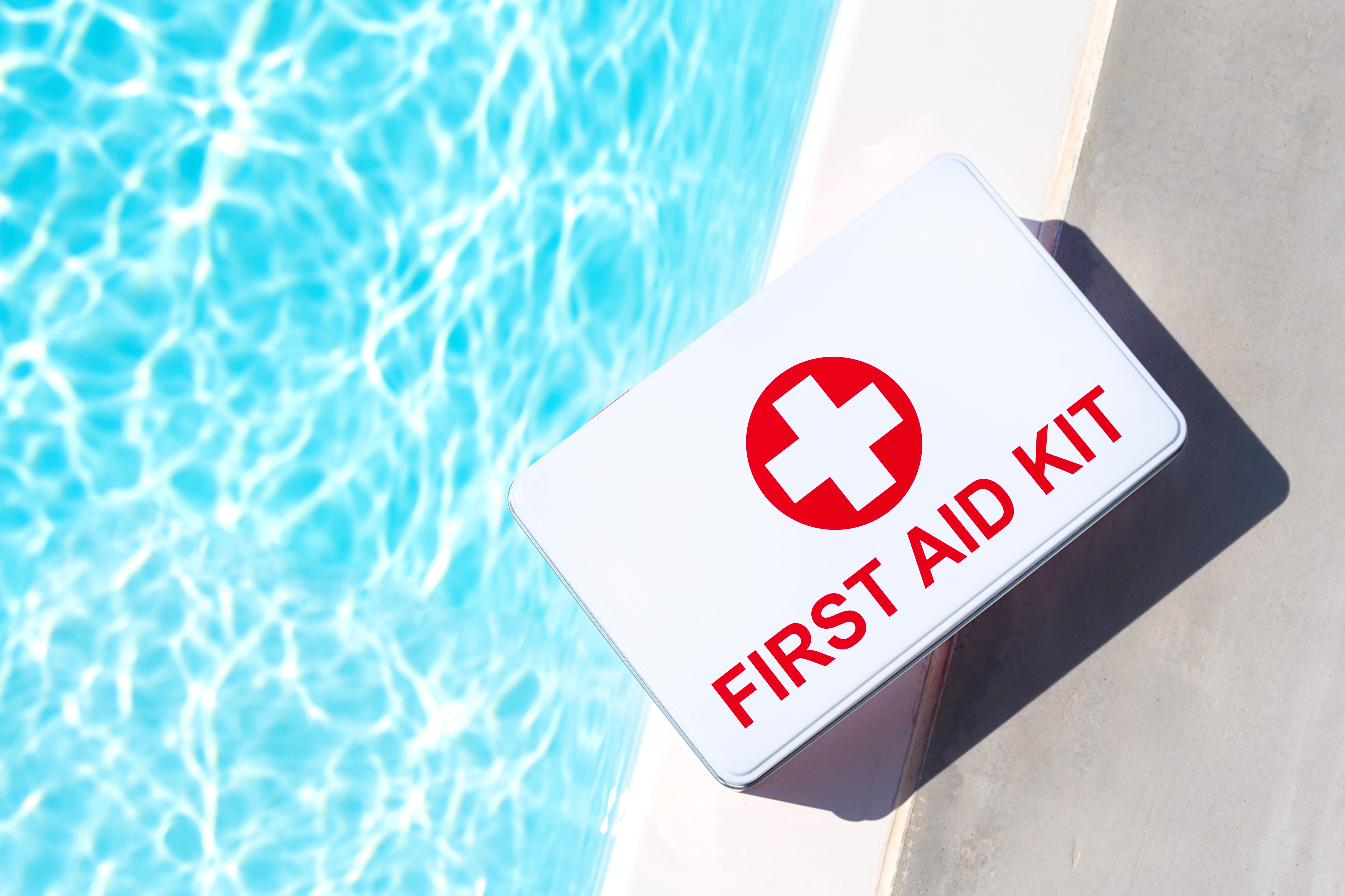 first,aid,kit,near,swimming,pool.,concept